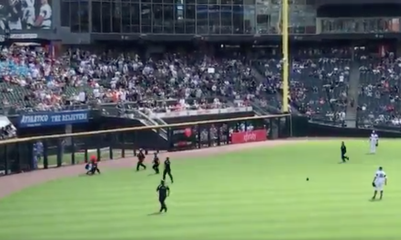 Security personnel at Guaranteed Rate Field are viewed through the