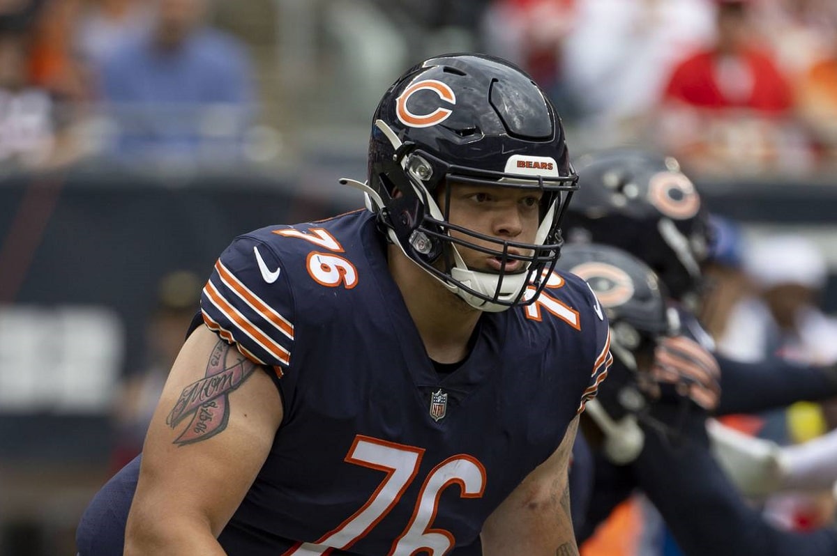 Chicago Bears offensive tackle Teven Jenkins (76) runs off the