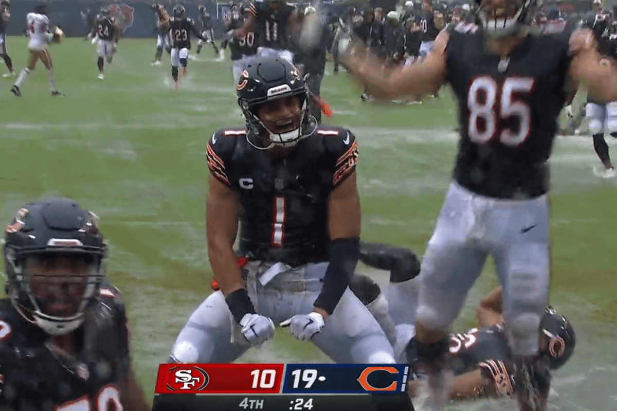 Justin Fields Chicago Bears Sliding In The Rain Victory Celebration Bo FOCO