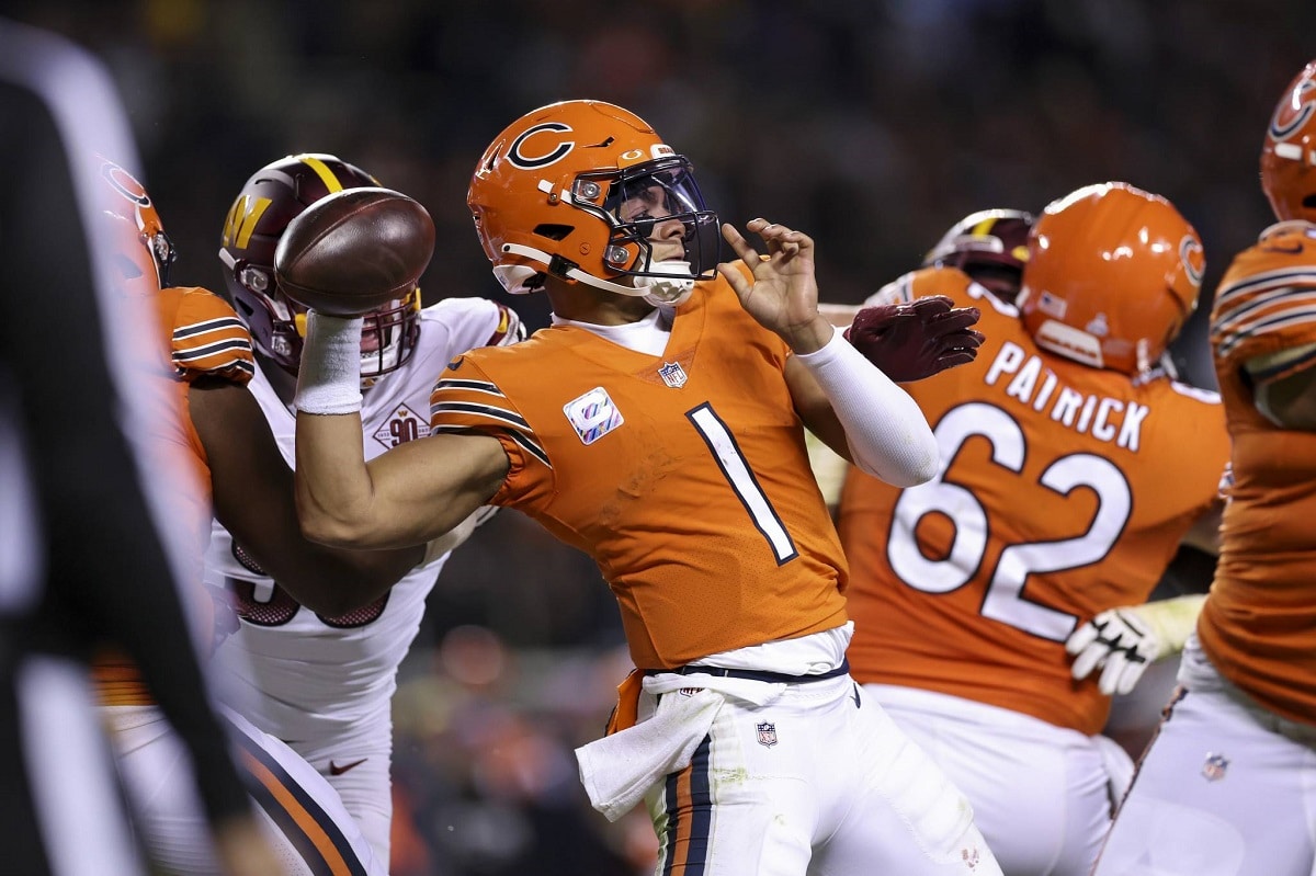 Green Bay Packers center Lucas Patrick (62) passes the ball during