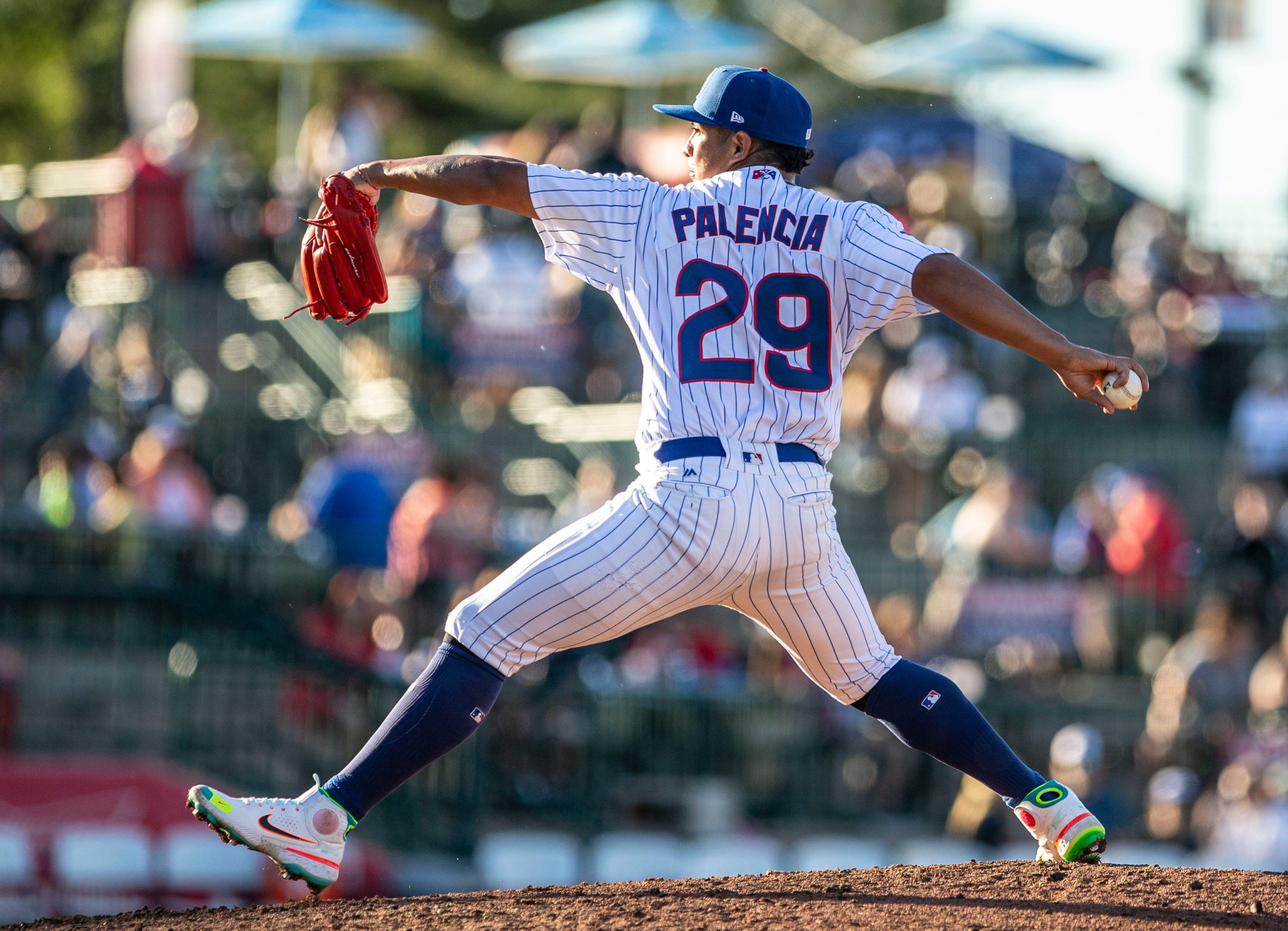 Chicago Cubs starting pitcher Adbert Alzolay is congratulated in