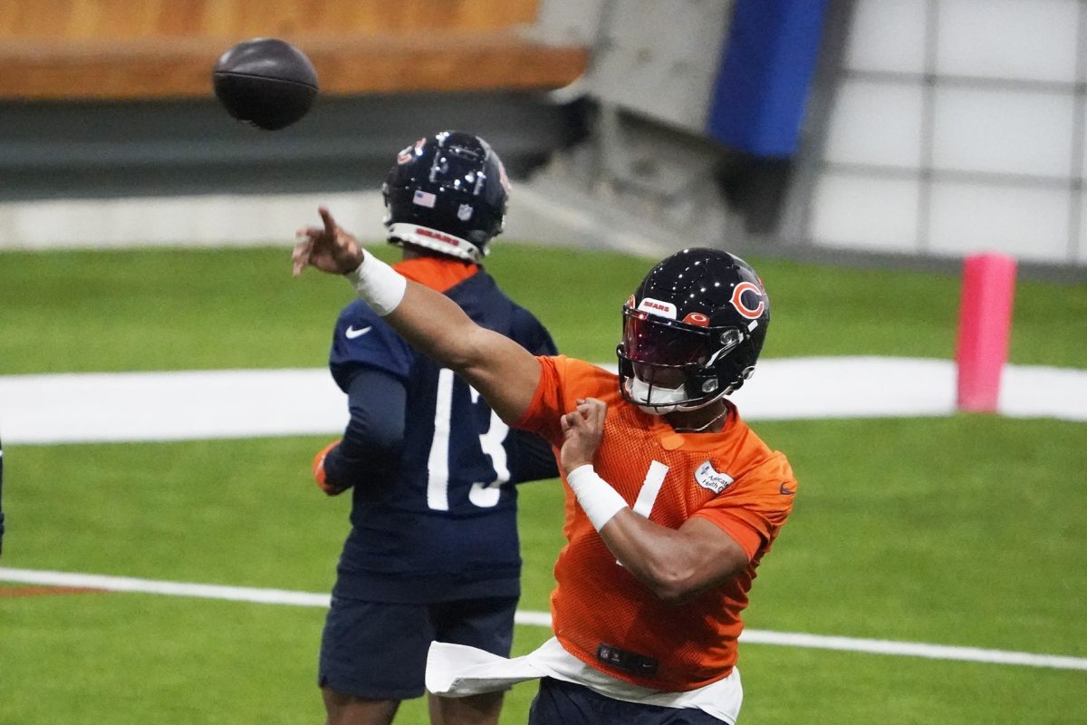 Justin Fields of the Chicago Bears takes part in a drill during