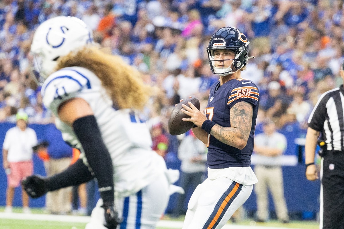 Chicago Bears quarterback Tyson Bagent scrambles for a touchdown