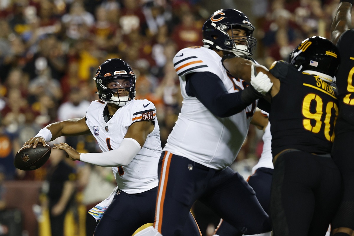 A Chicago Bears fan holds a quarterback Justin Fields jersey before an NFL  football game against the Houston Texans Sunday, Sept. 25, 2022, in  Chicago. (AP Photo/Nam Y. Huh Stock Photo - Alamy